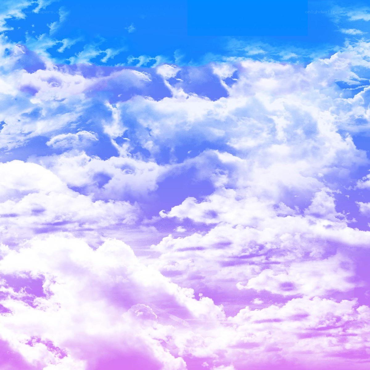 vibrant sky with fluffy clouds
