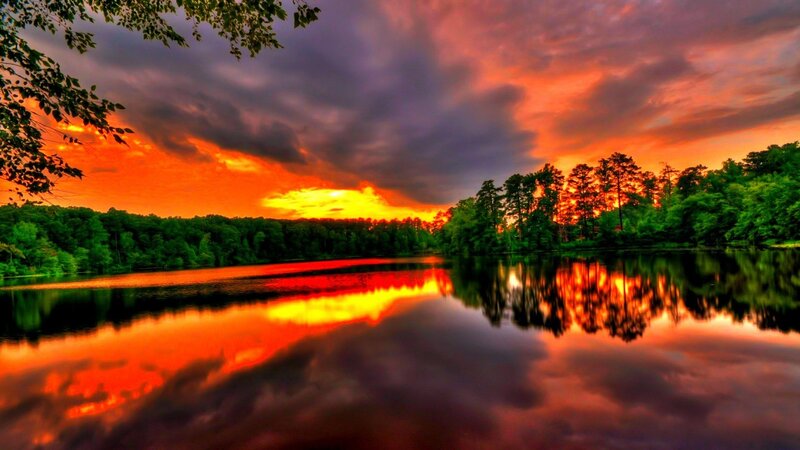 Vibrant sunset over a calm lake