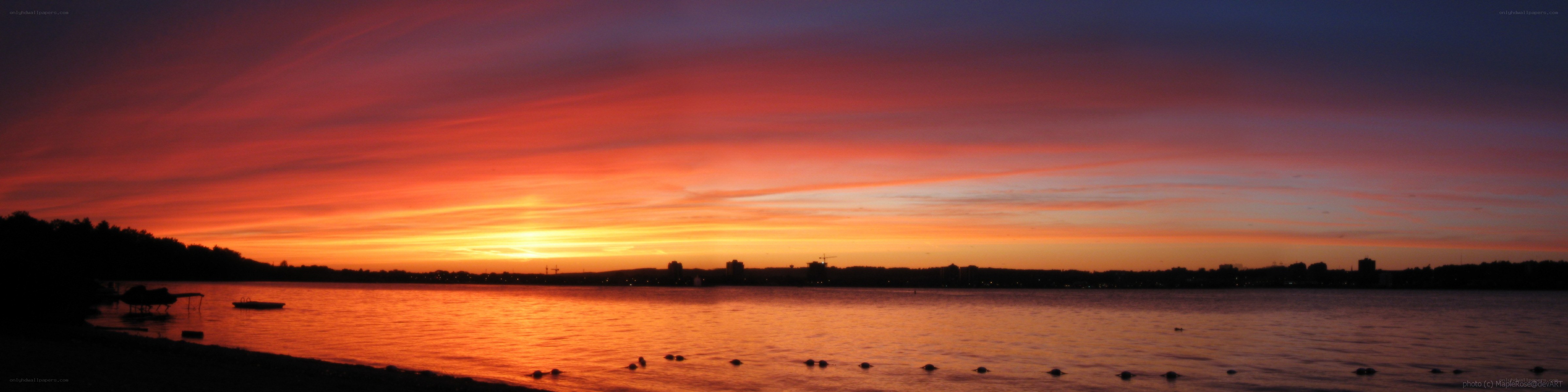 Vibrant sunset over a calm lake