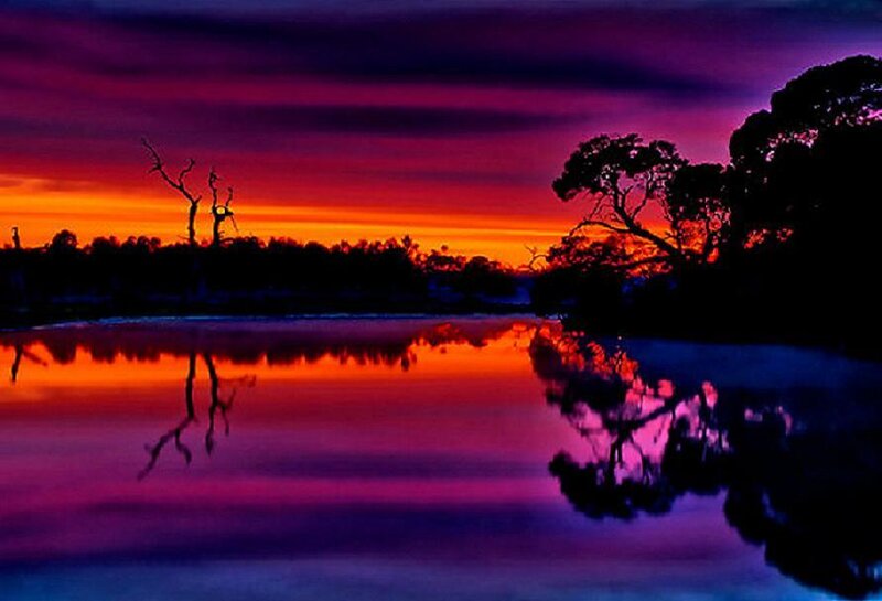 Vibrant sunset over a calm lake