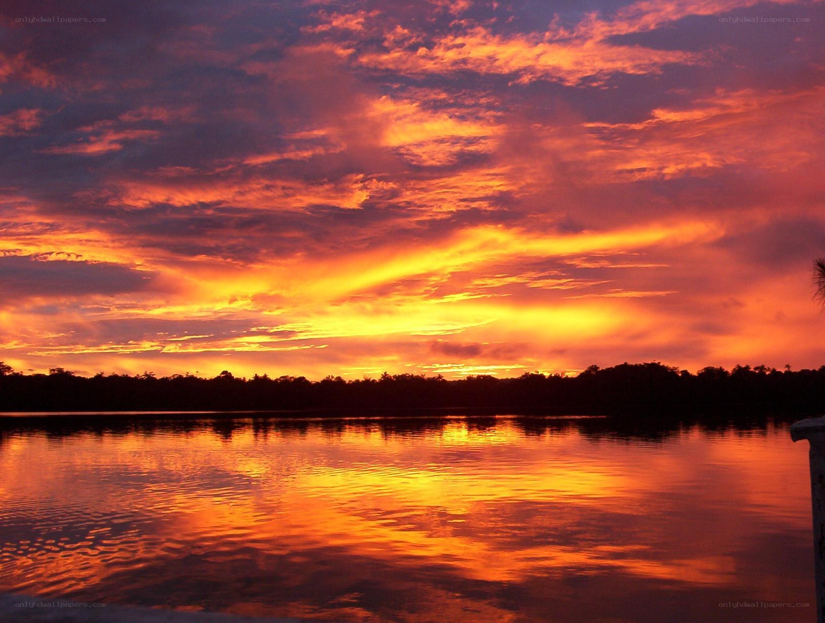 Vibrant sunset over a calm river