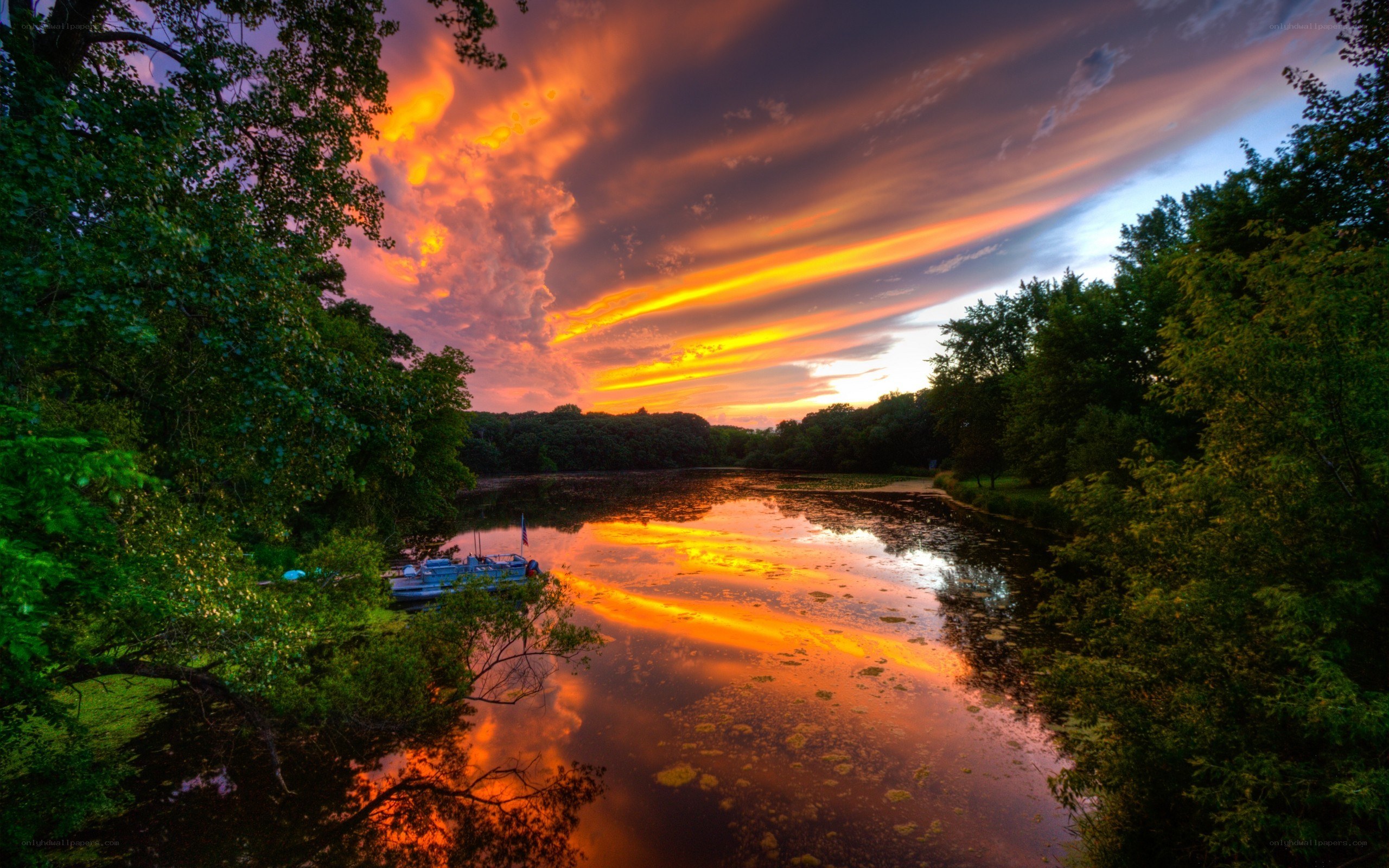 Vibrant sunset over a calm river