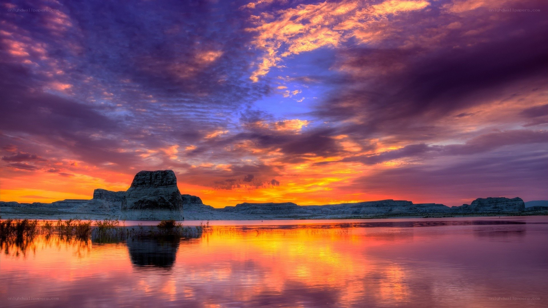 Vibrant sunset over a desert lake