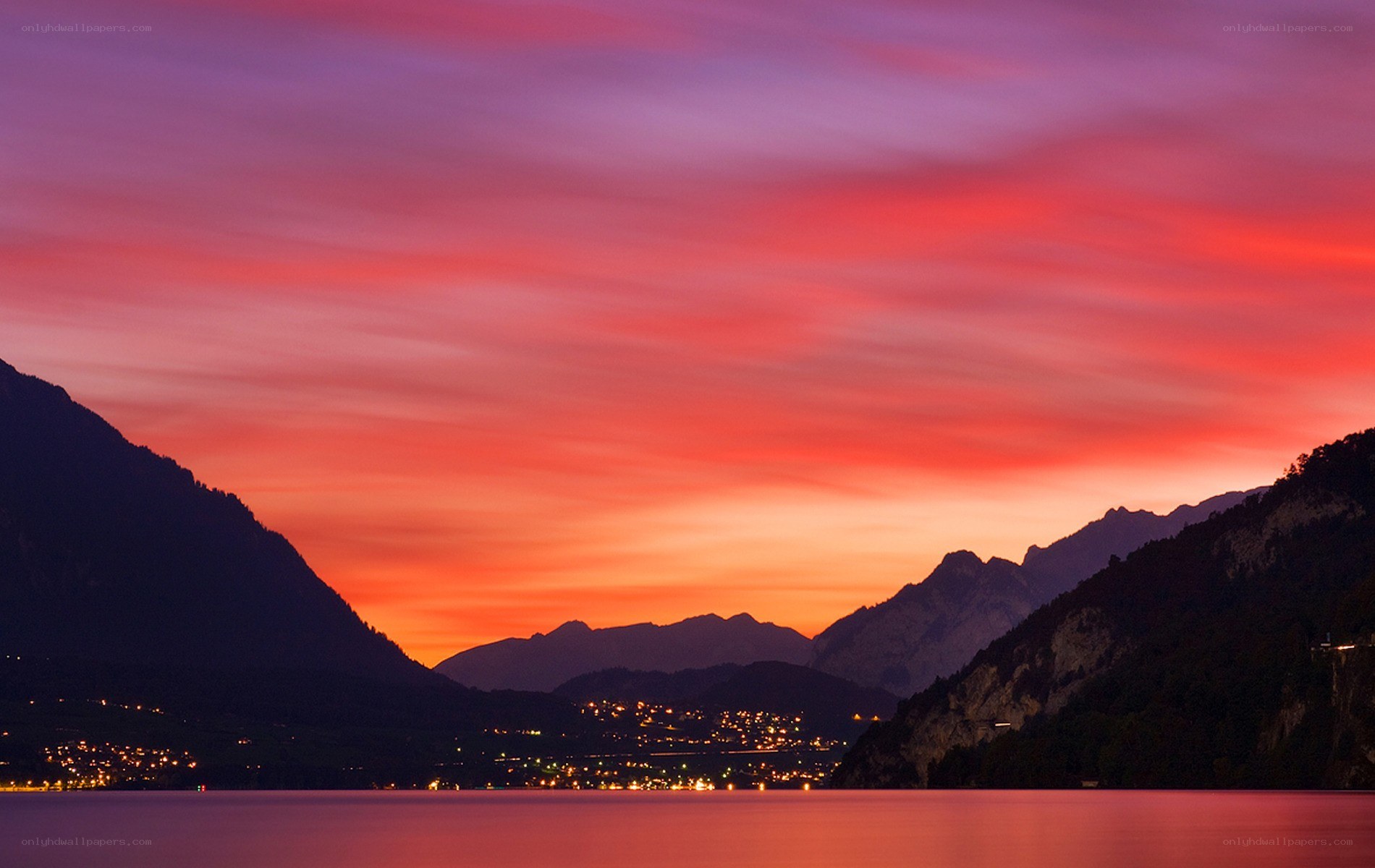 Vibrant sunset over a mountain lake