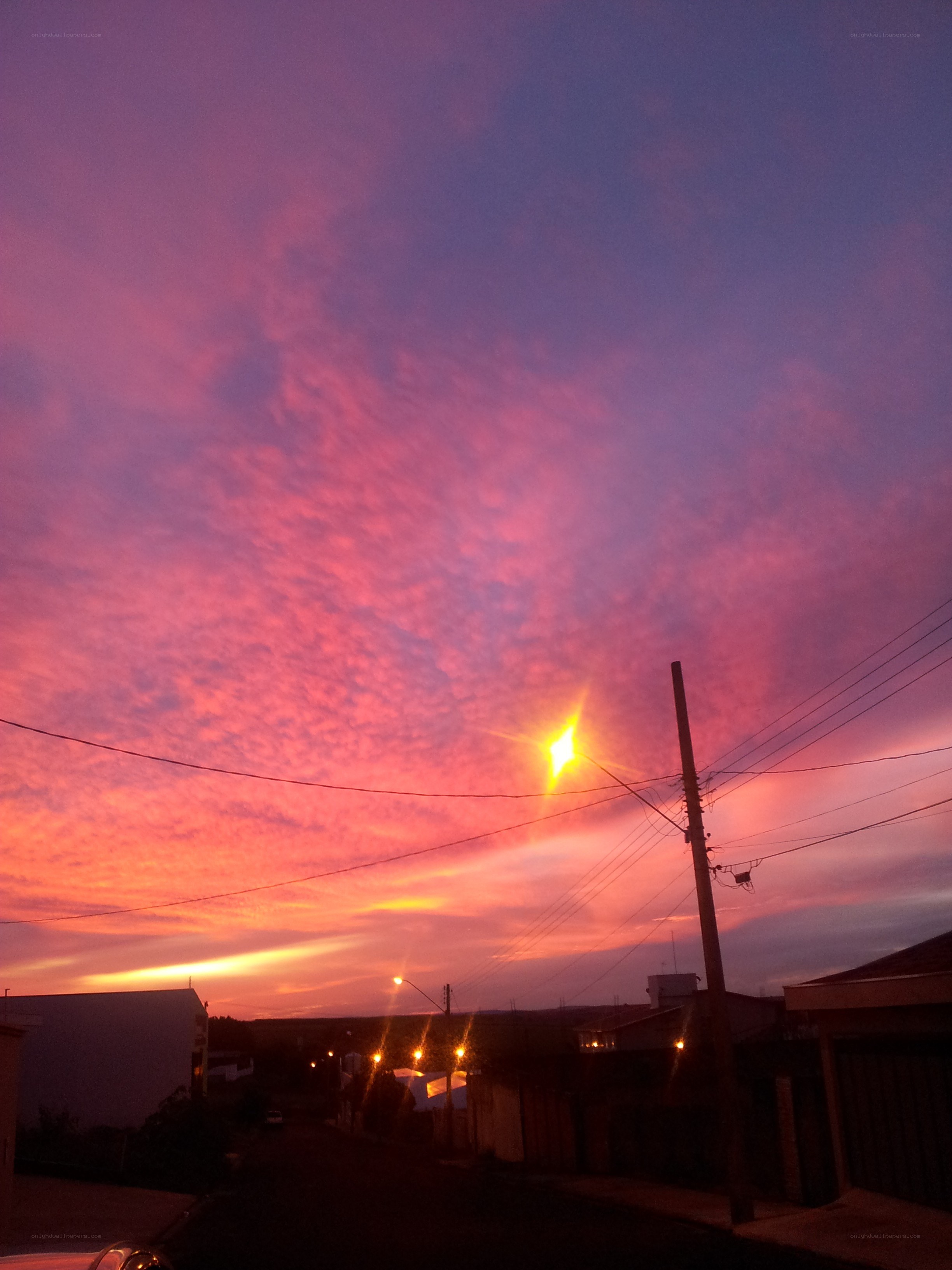 Vibrant sunset over a quiet street