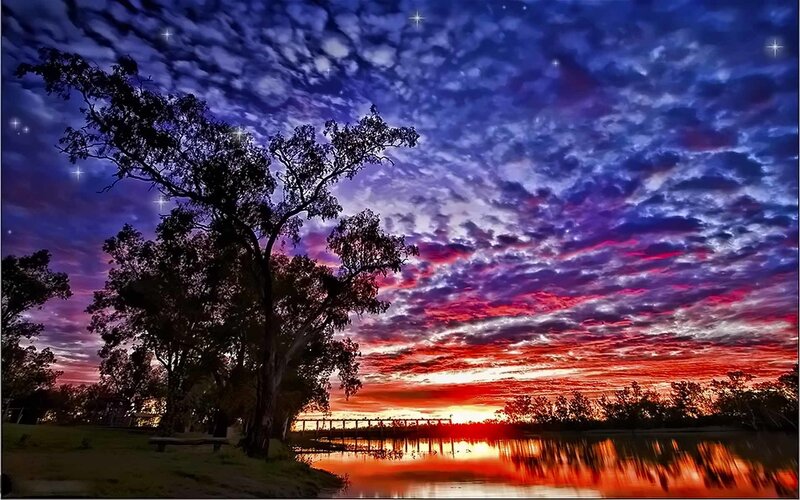 Vibrant sunset over a river
