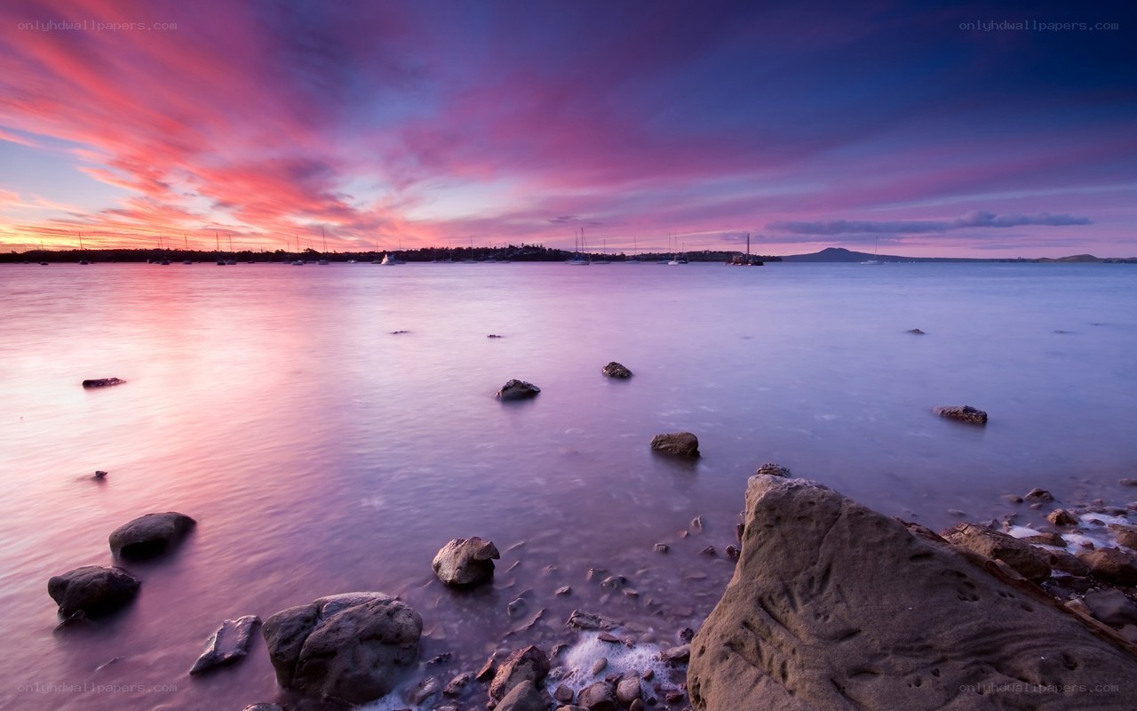 Vibrant sunset over calm bay