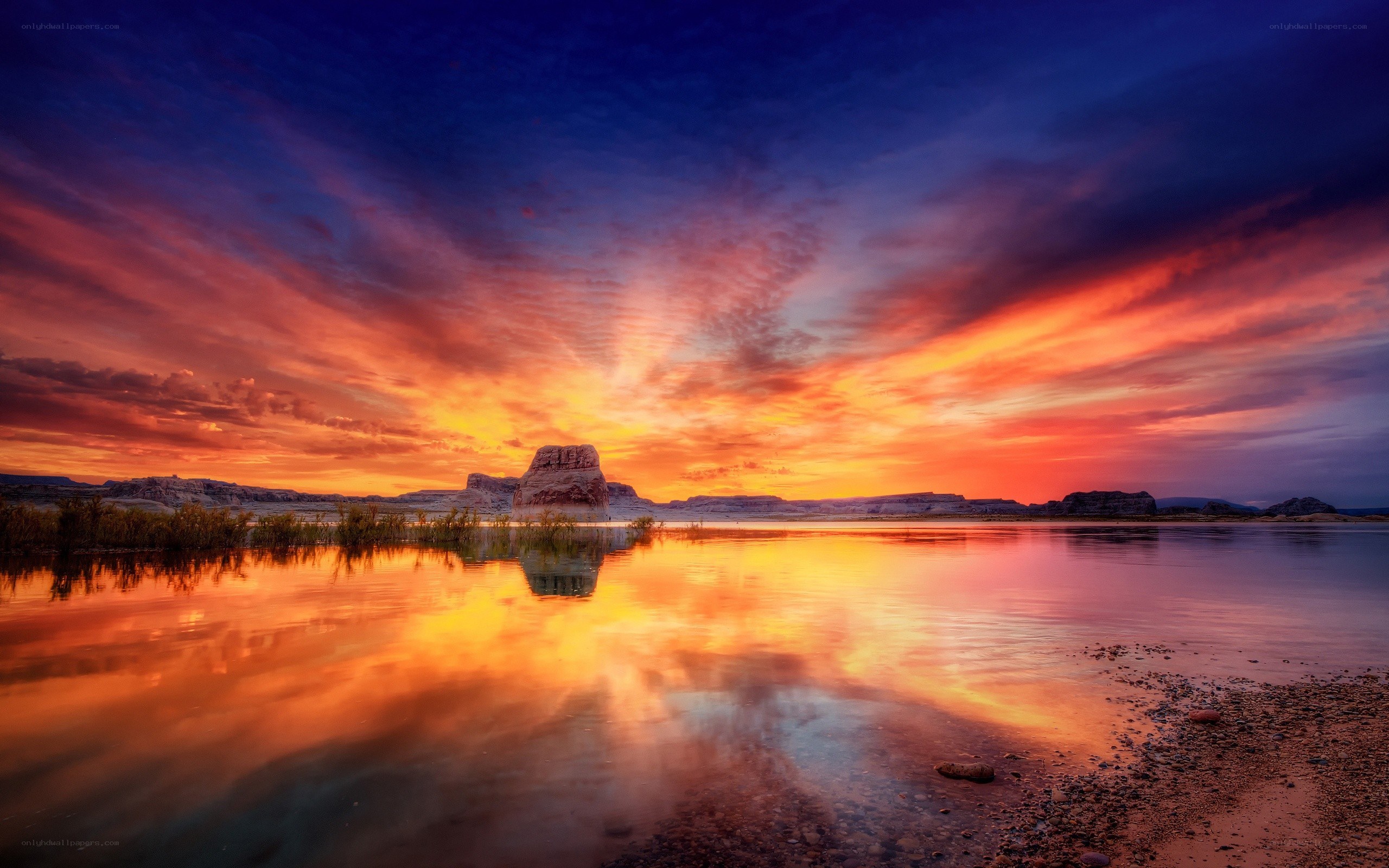 Vibrant sunset over calm lake