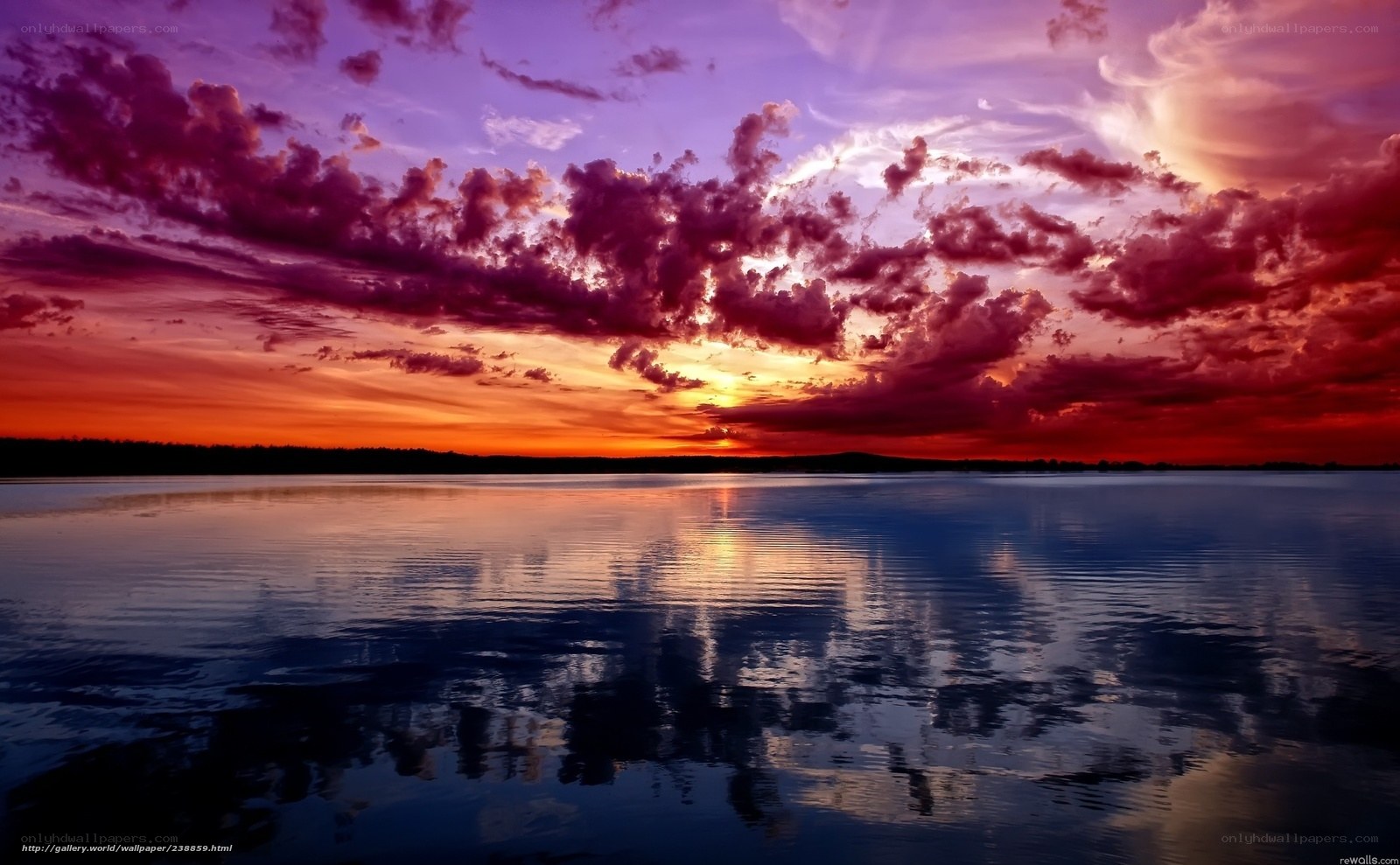 Vibrant sunset over calm lake