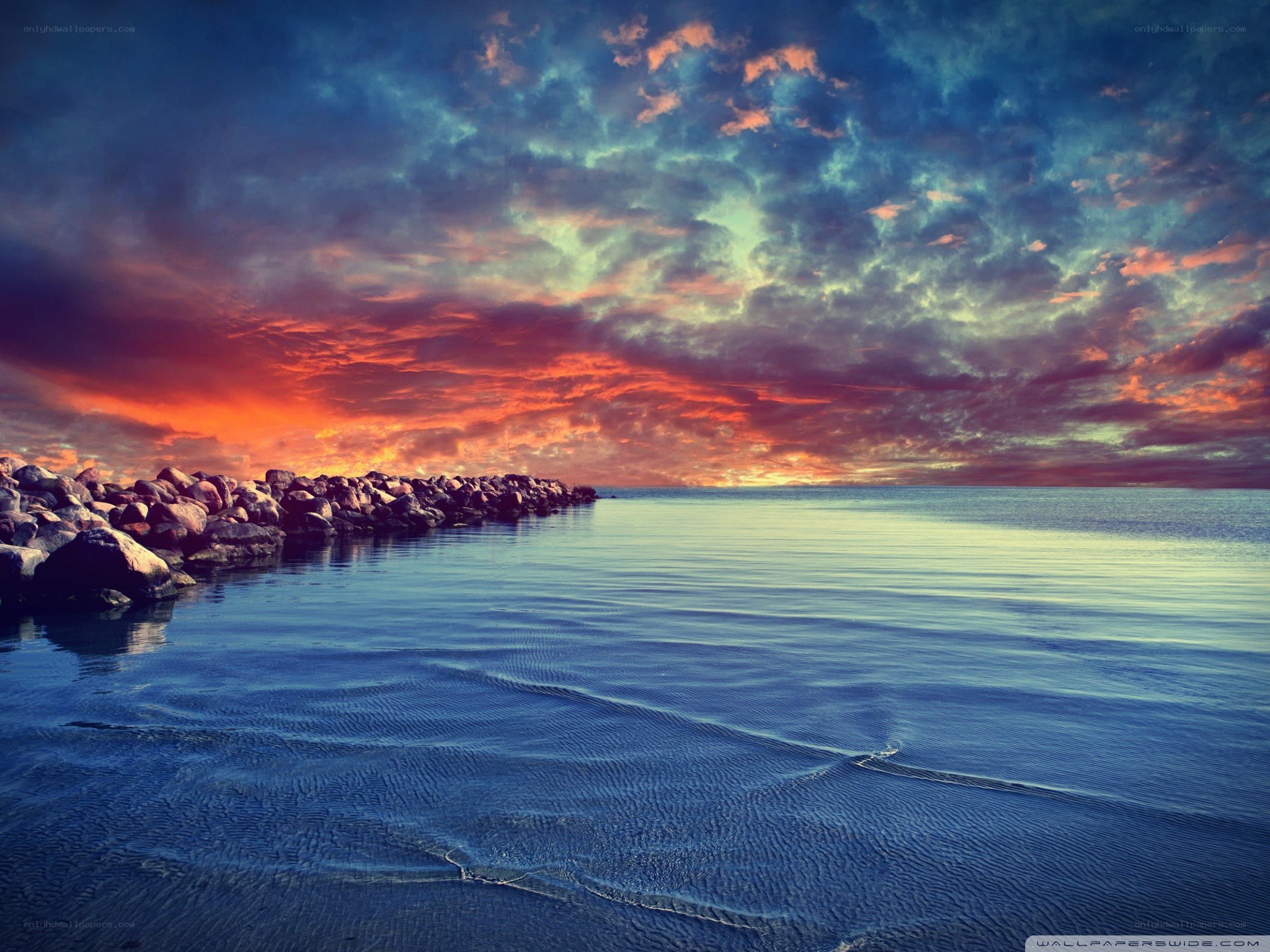 Vibrant sunset over calm sea