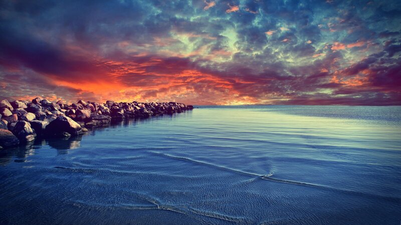 Vibrant sunset over calm sea