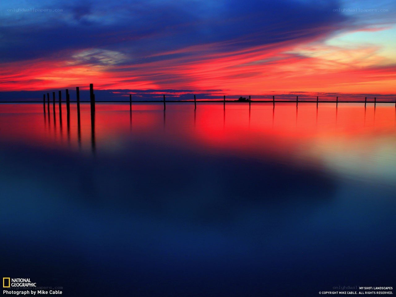 Vibrant sunset over calm water