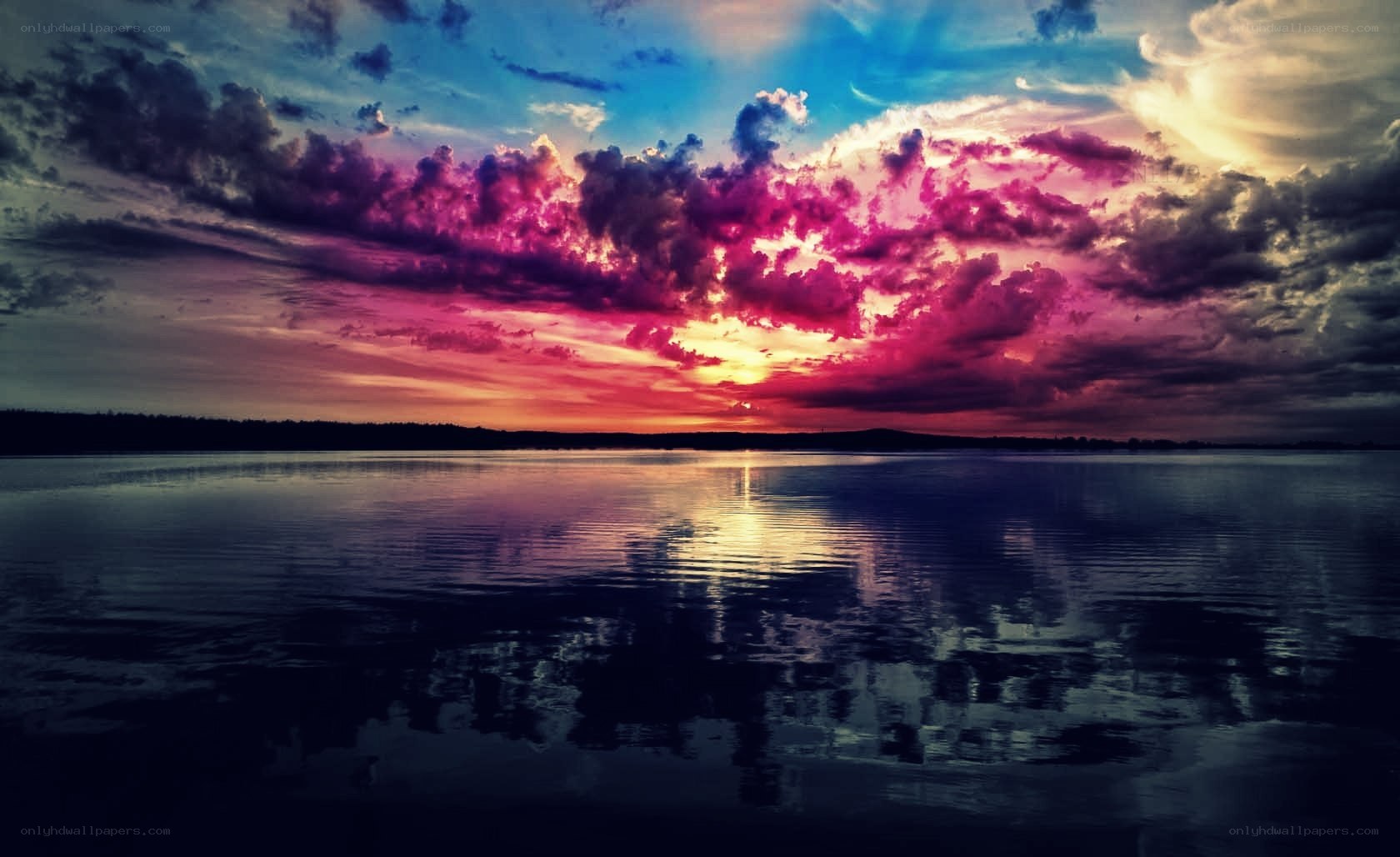 Vibrant sunset over calm water