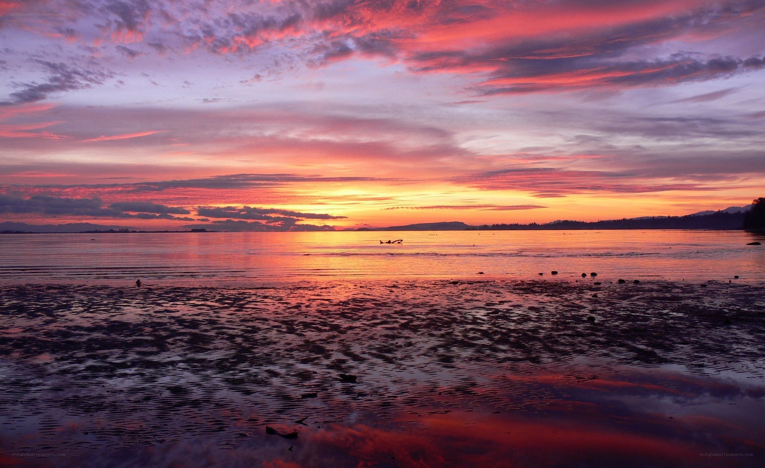 Vibrant sunset over calm waters