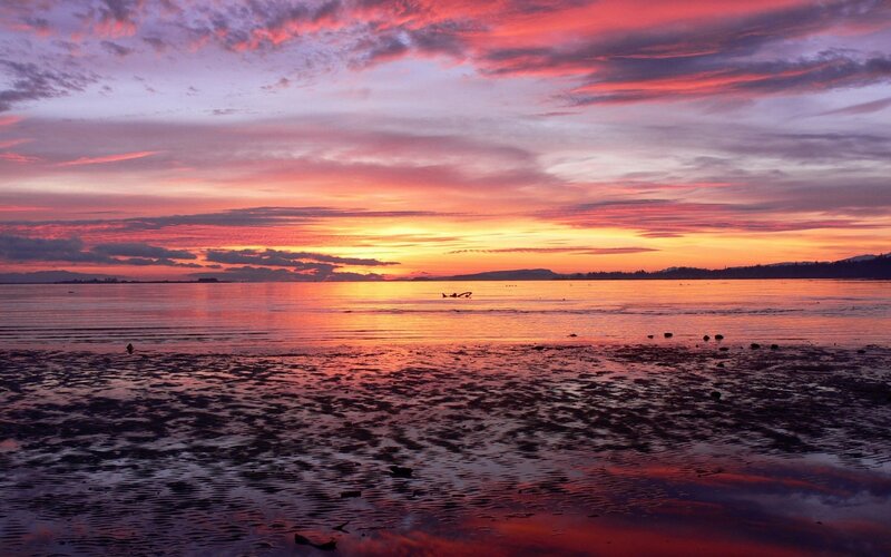 Vibrant sunset over calm waters