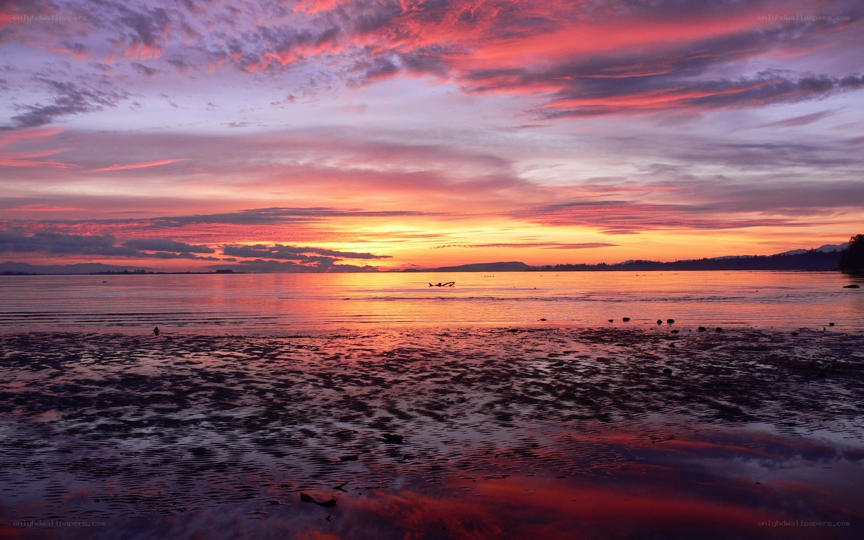 Vibrant sunset over calm waters