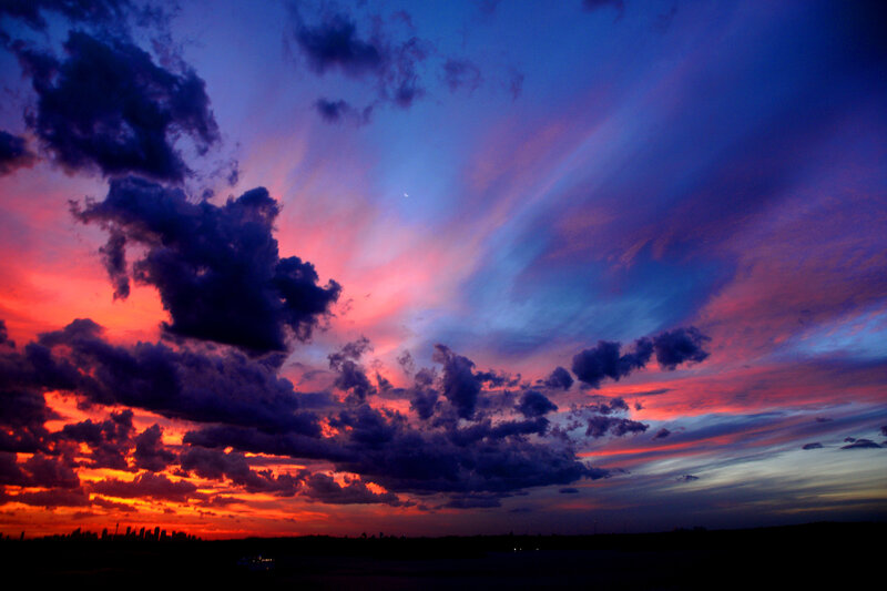 vibrant sunset over city skyline
