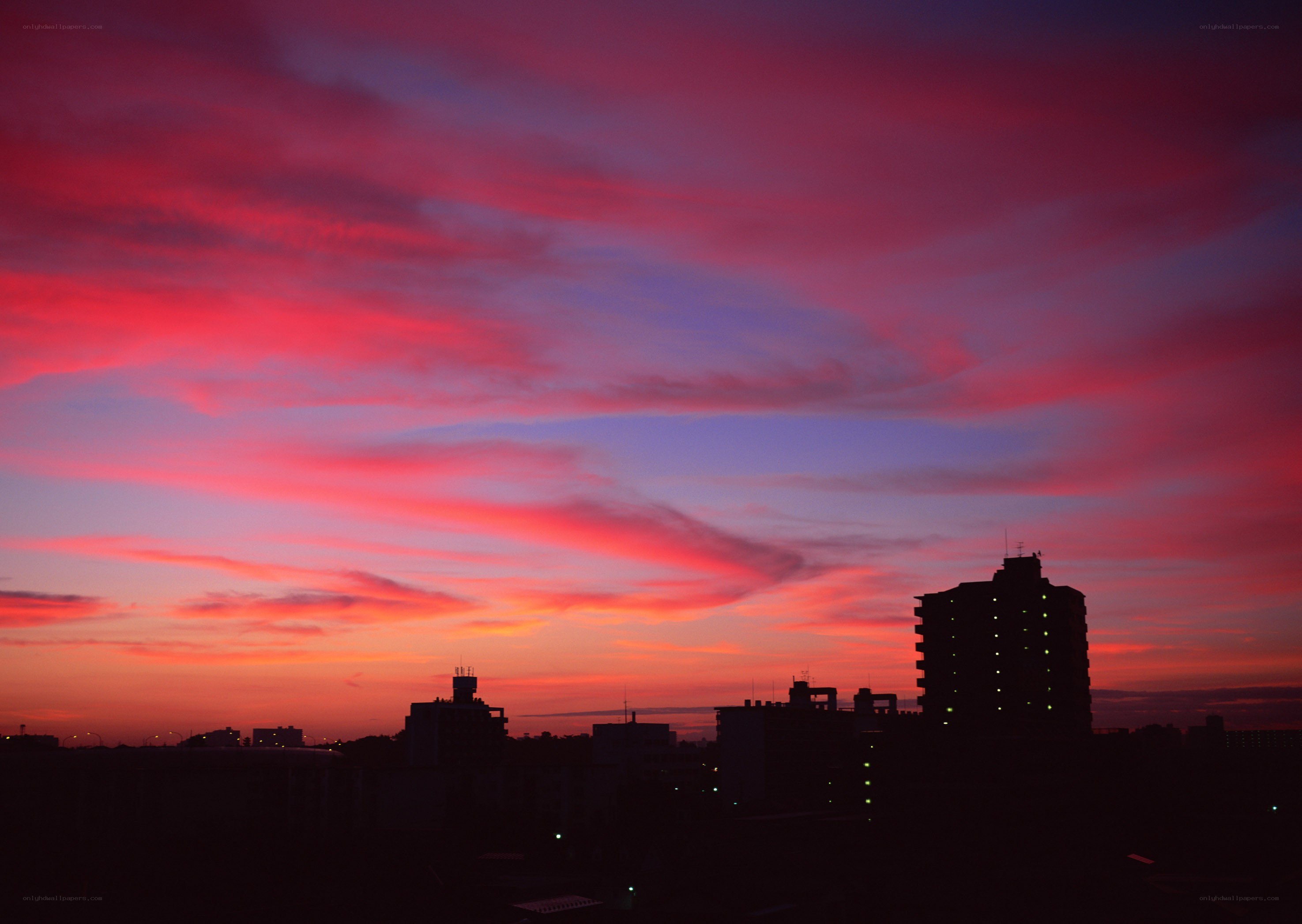 vibrant sunset over city skyline