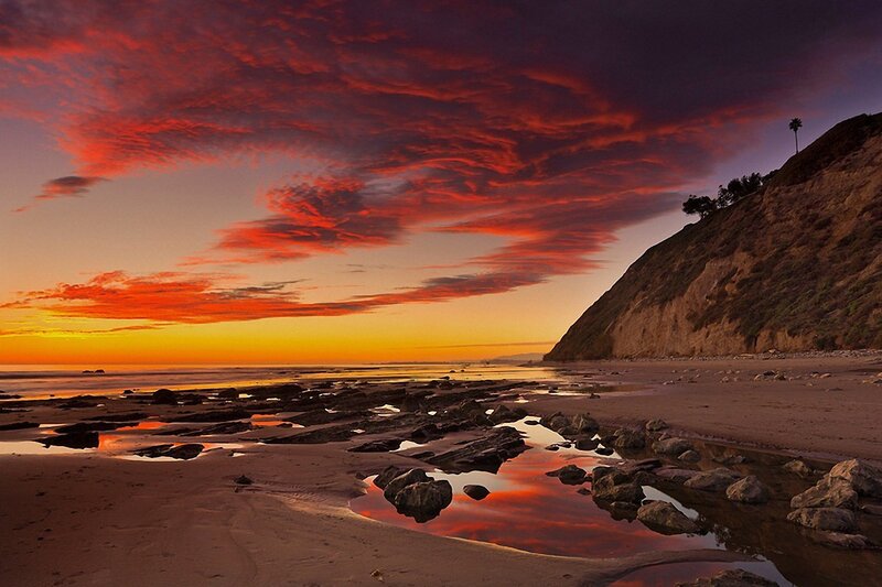 Vibrant sunset over coastal beach