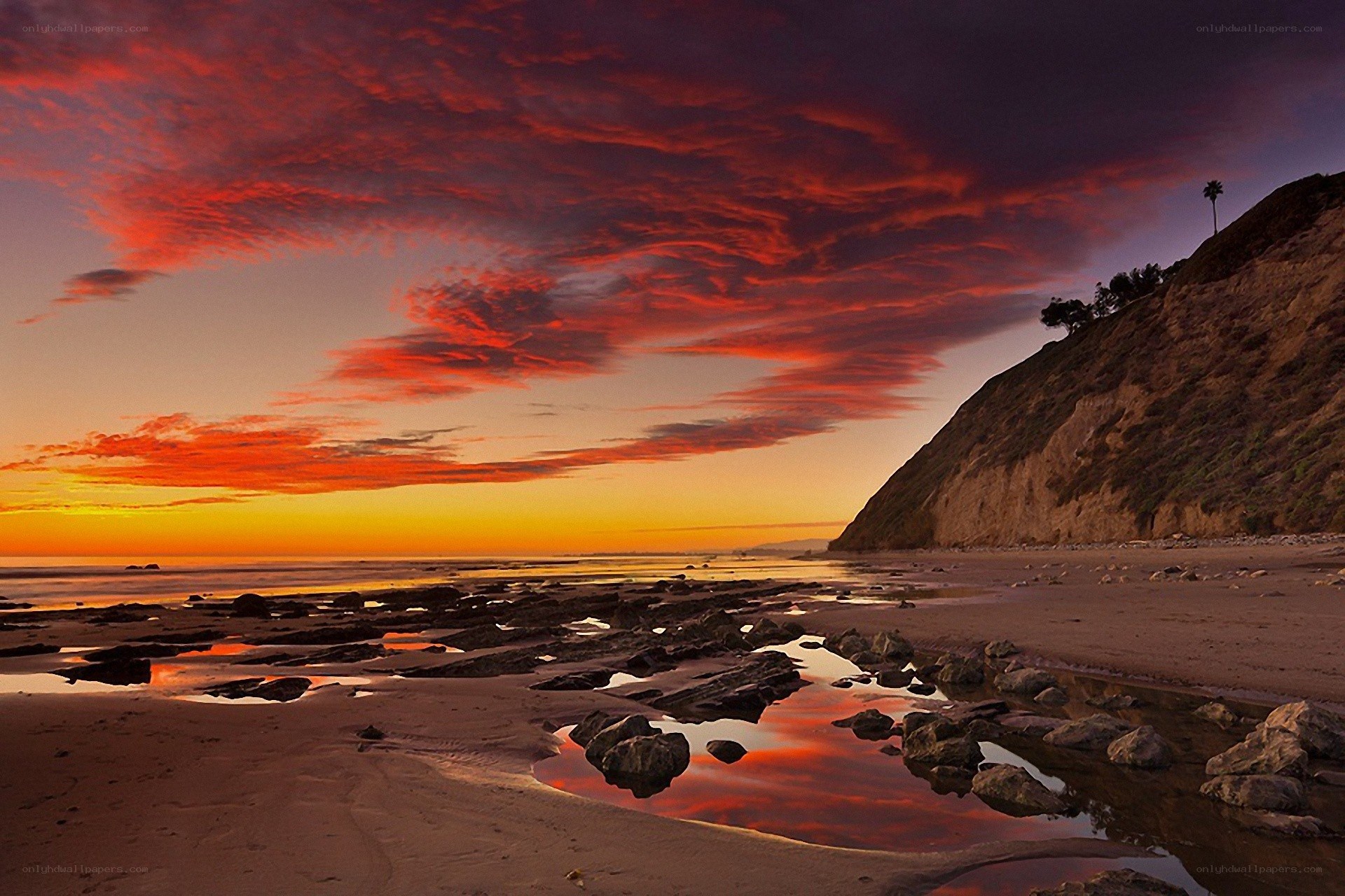 Vibrant sunset over coastal beach