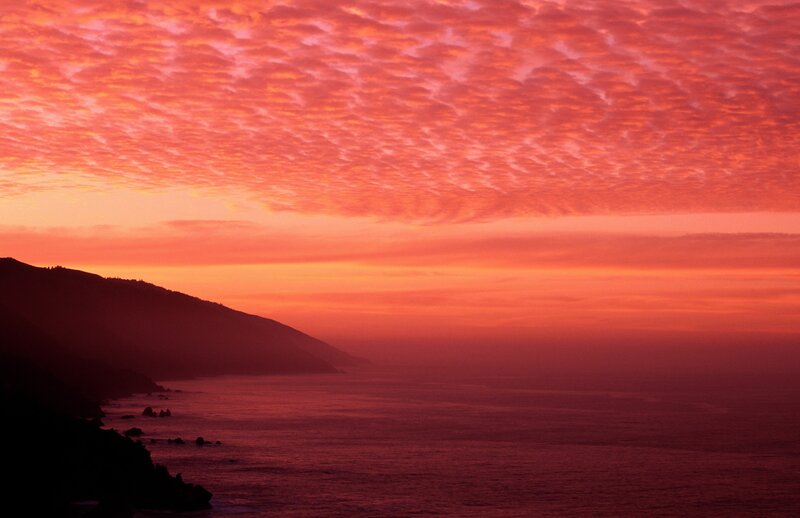 Vibrant sunset over coastal cliffs