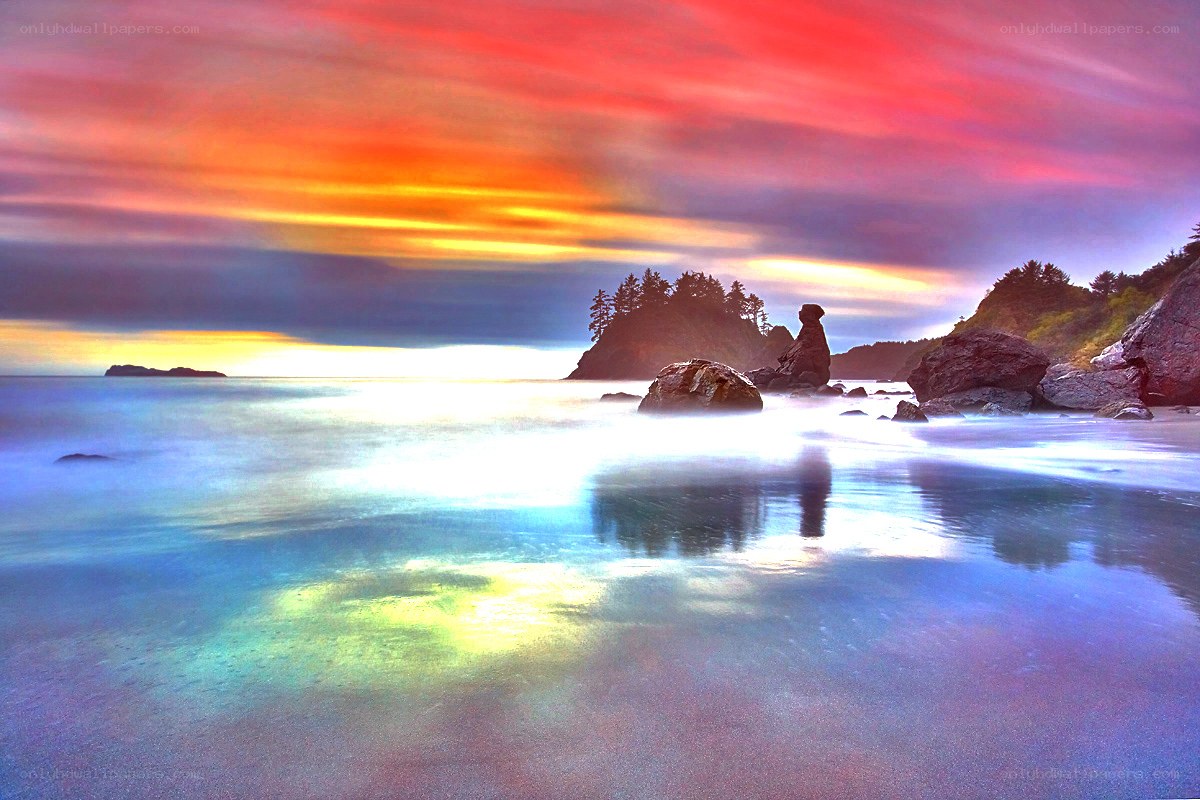 Vibrant sunset over coastal rocks