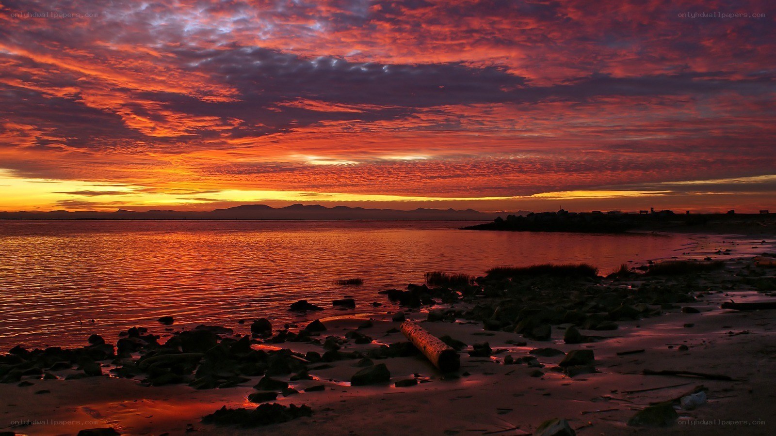 Vibrant sunset over coastal shore