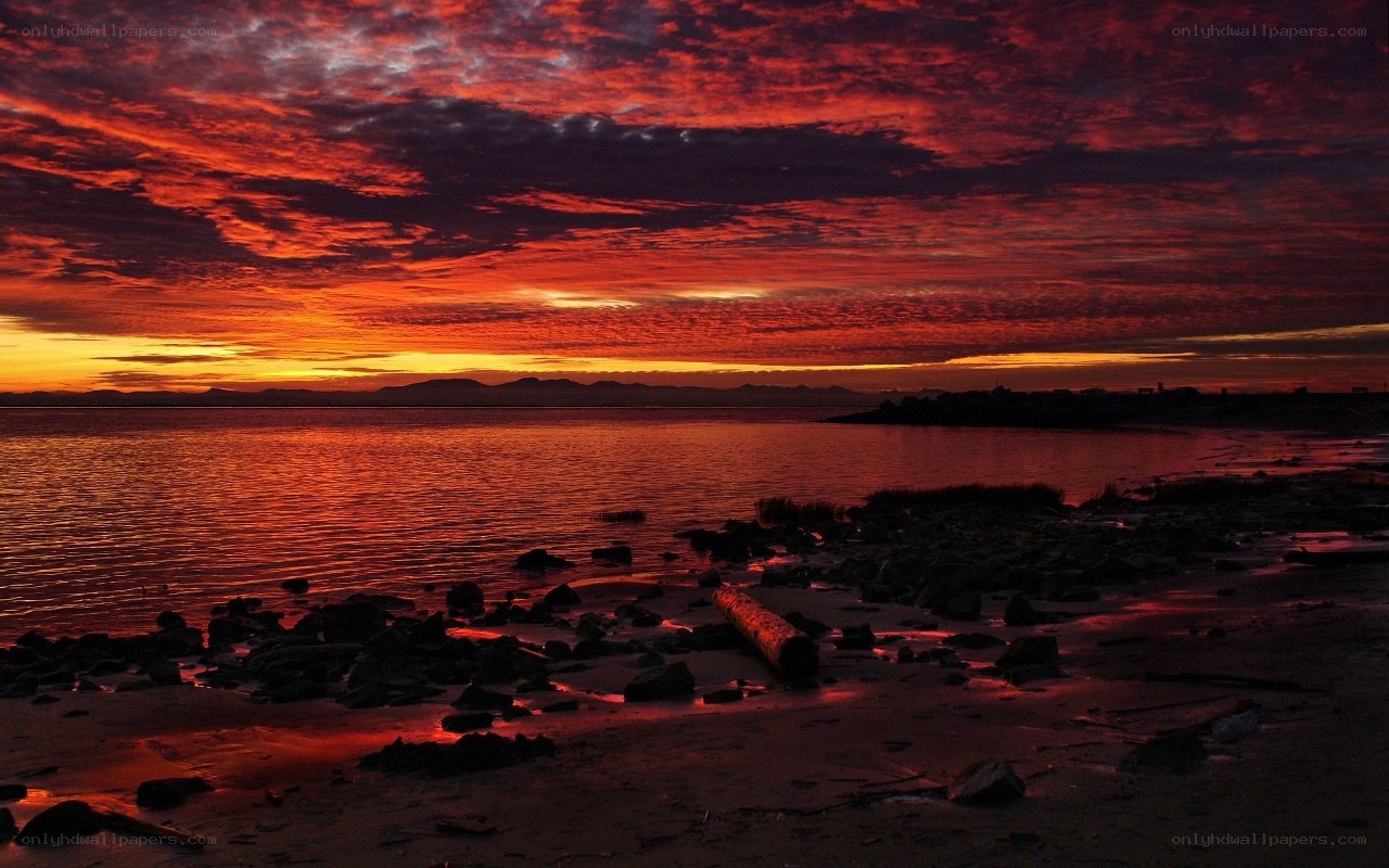 Vibrant sunset over coastal waters