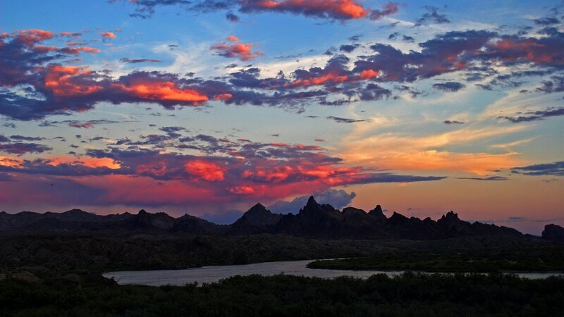 Vibrant sunset over desert mountains