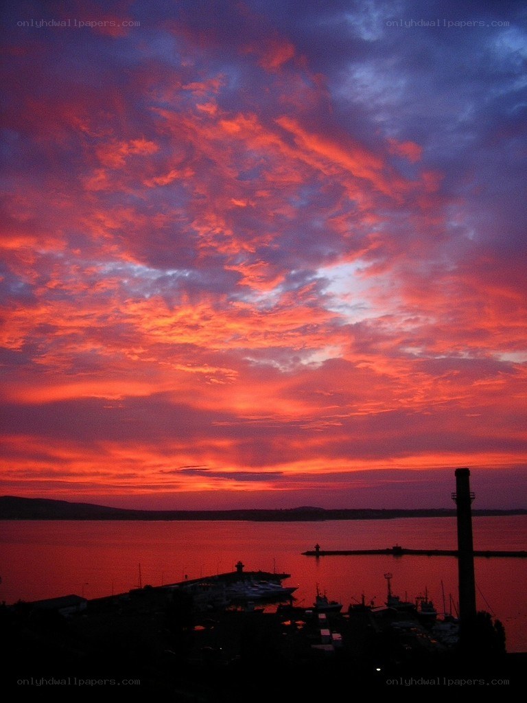 Vibrant sunset over harbor