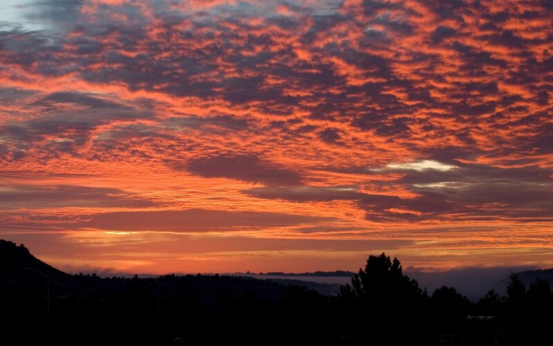 vibrant sunset over hills