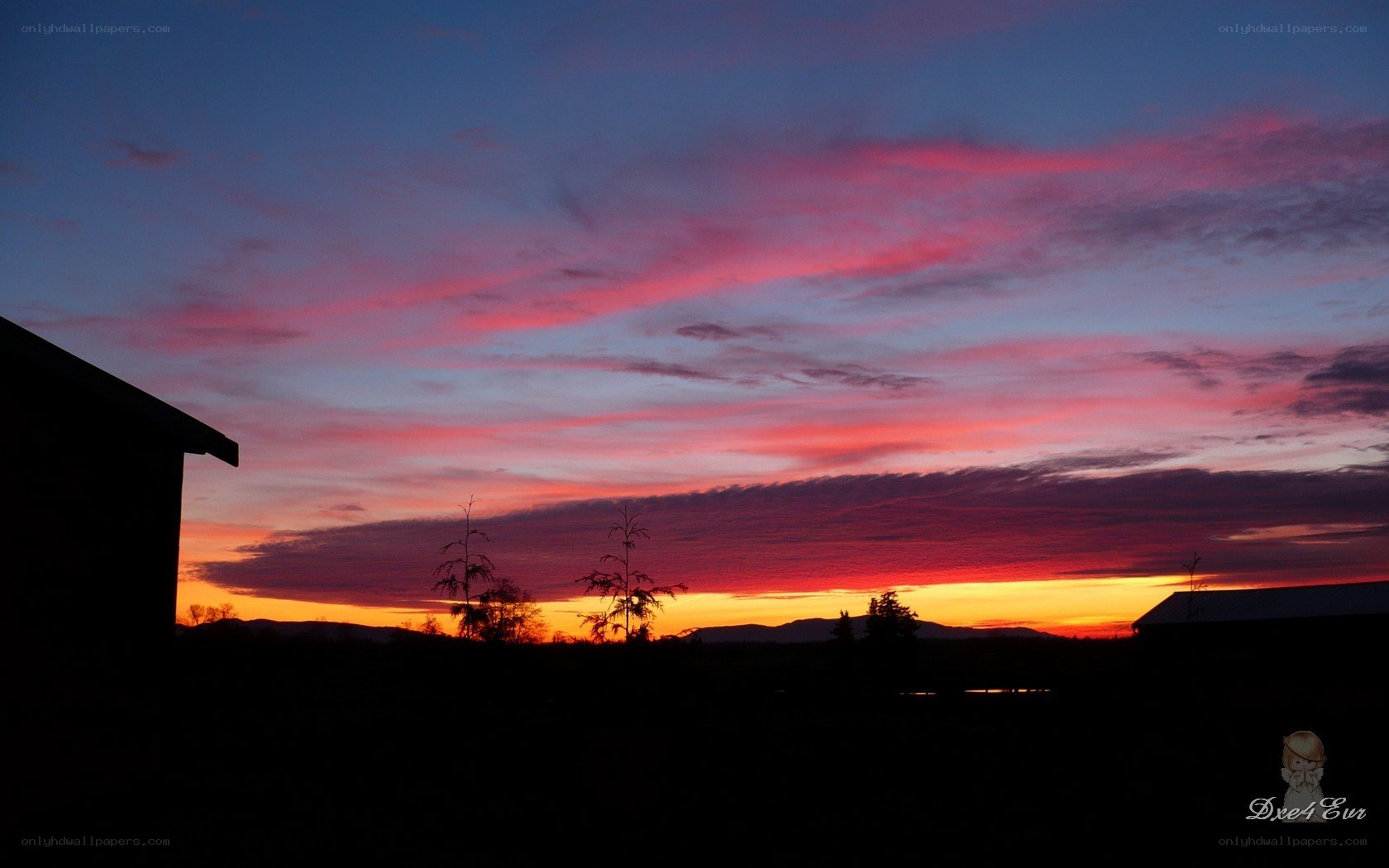 vibrant sunset over hills