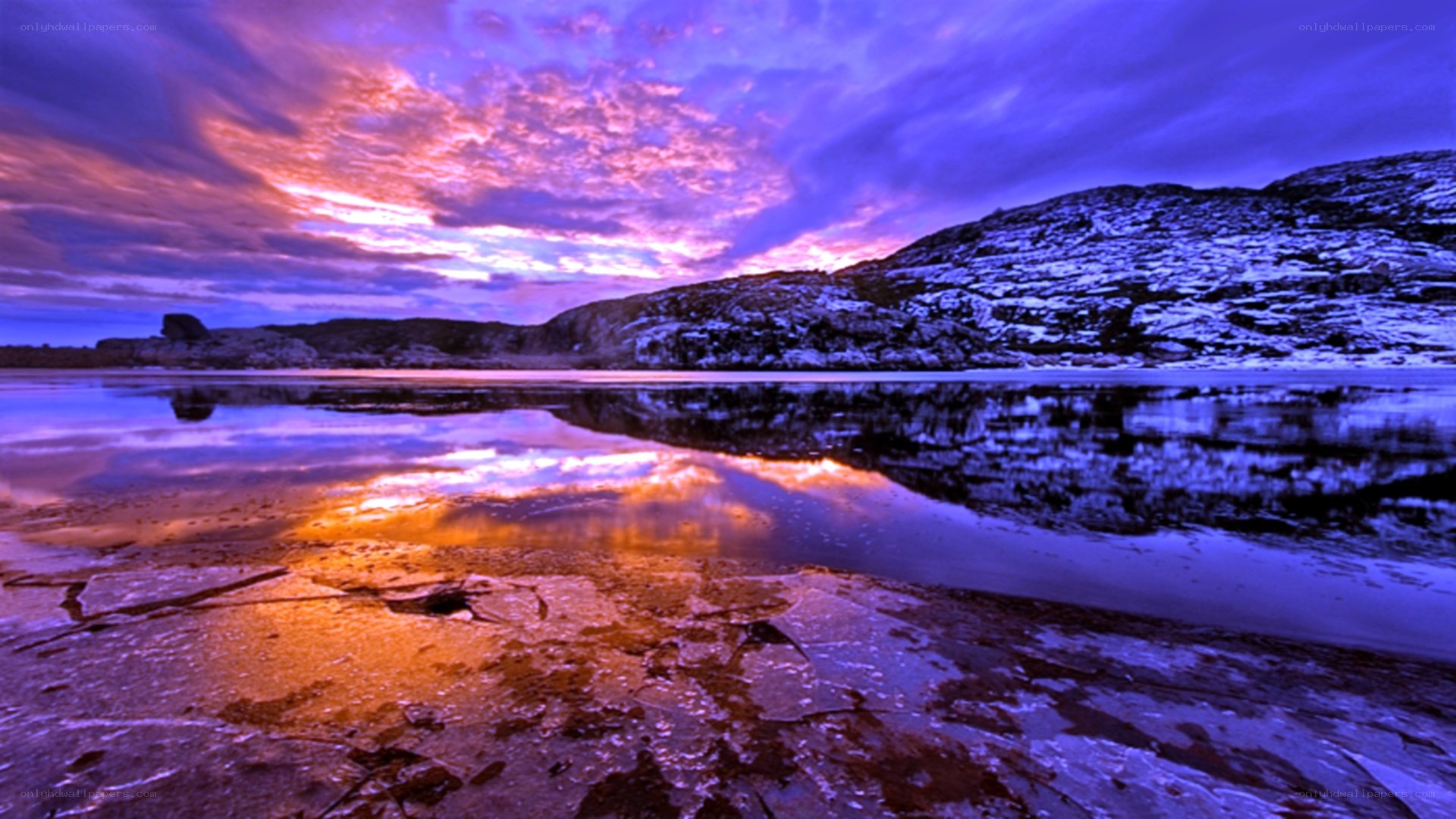 Vibrant sunset over icy landscape