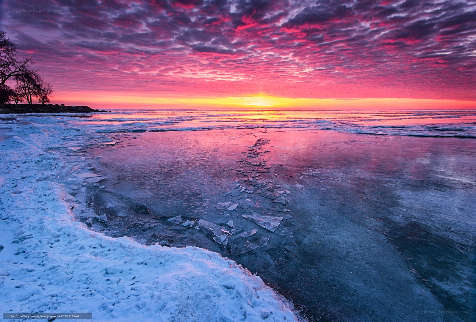 Vibrant sunset over icy shore