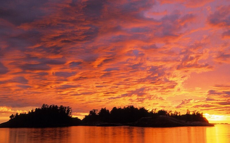Vibrant sunset over islands