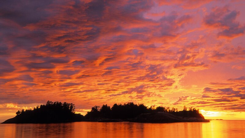 Vibrant sunset over islands