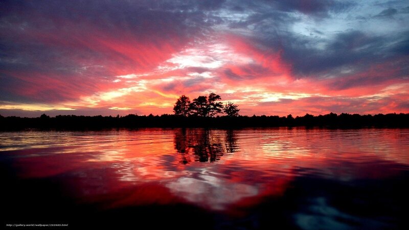 Vibrant sunset over lake