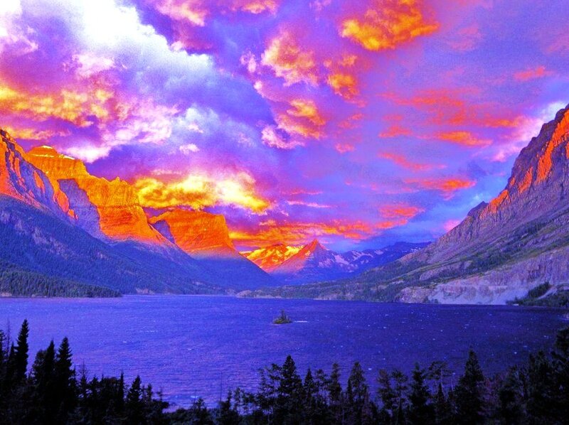 Vibrant sunset over mountain lake