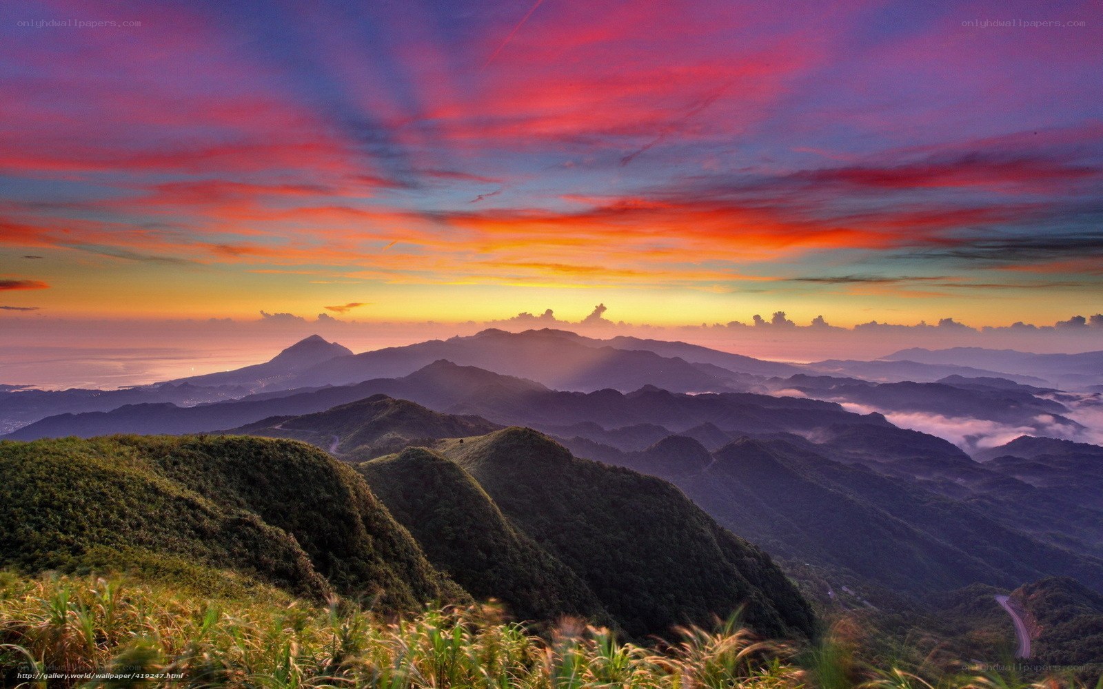 Vibrant sunset over mountain ranges