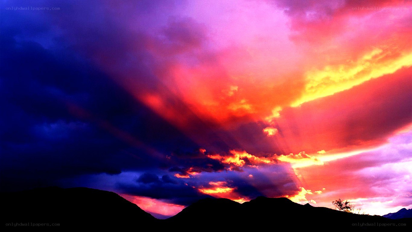 vibrant sunset over mountains