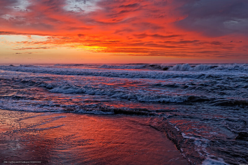 vibrant sunset over ocean waves