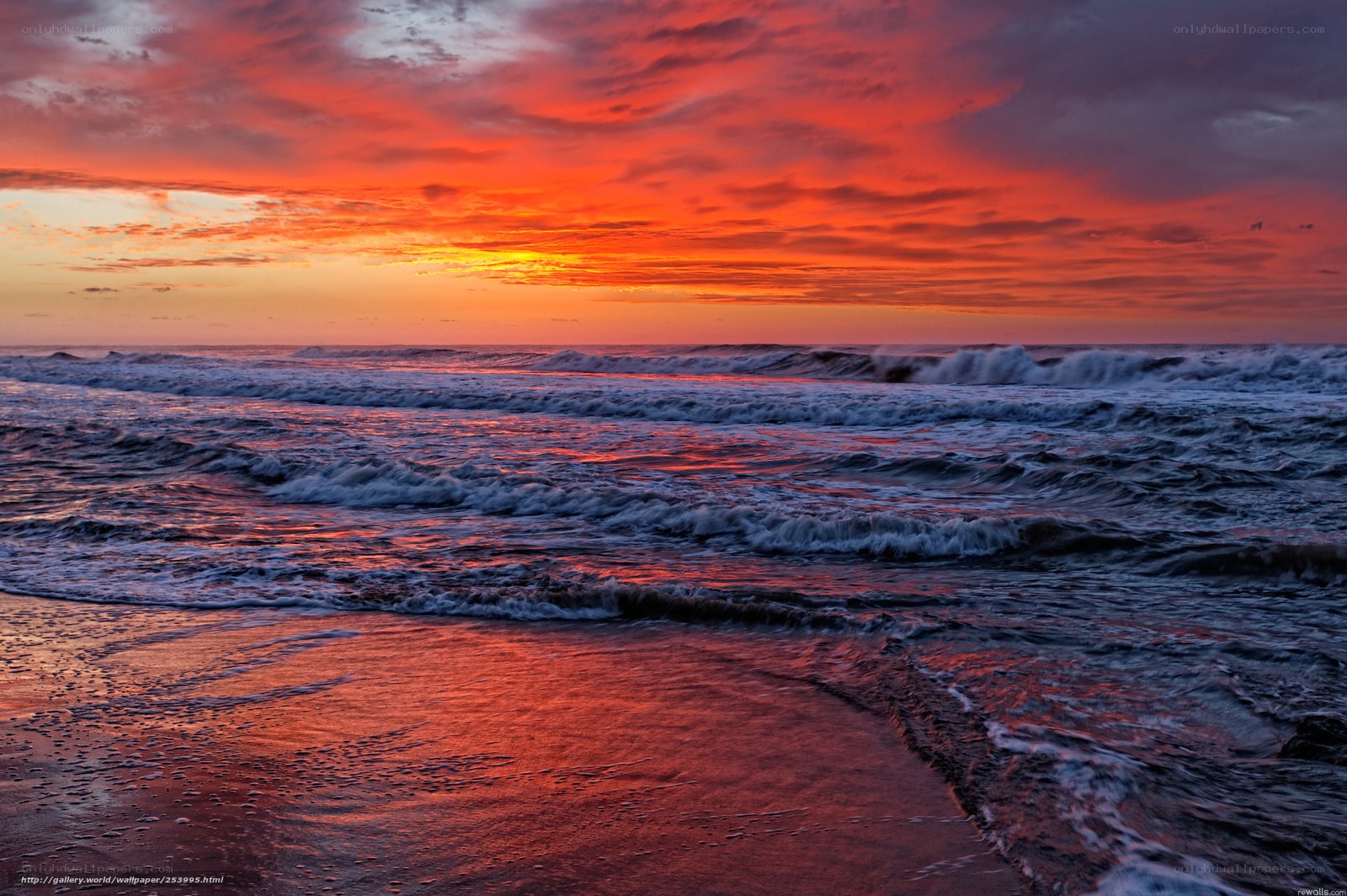 vibrant sunset over ocean waves