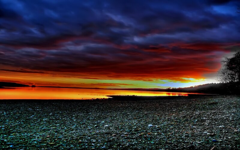 vibrant sunset over pebble beach
