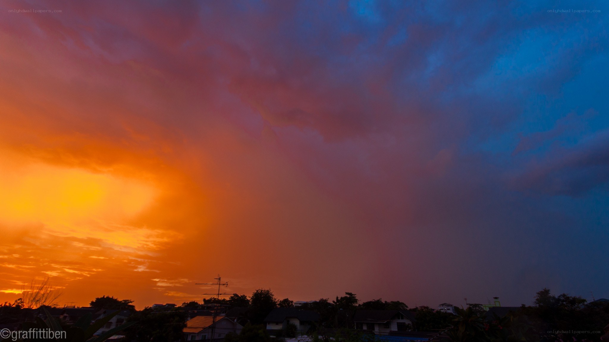 Vibrant sunset over residential area