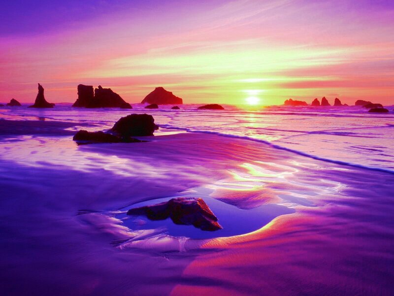 Vibrant sunset over rocky beach