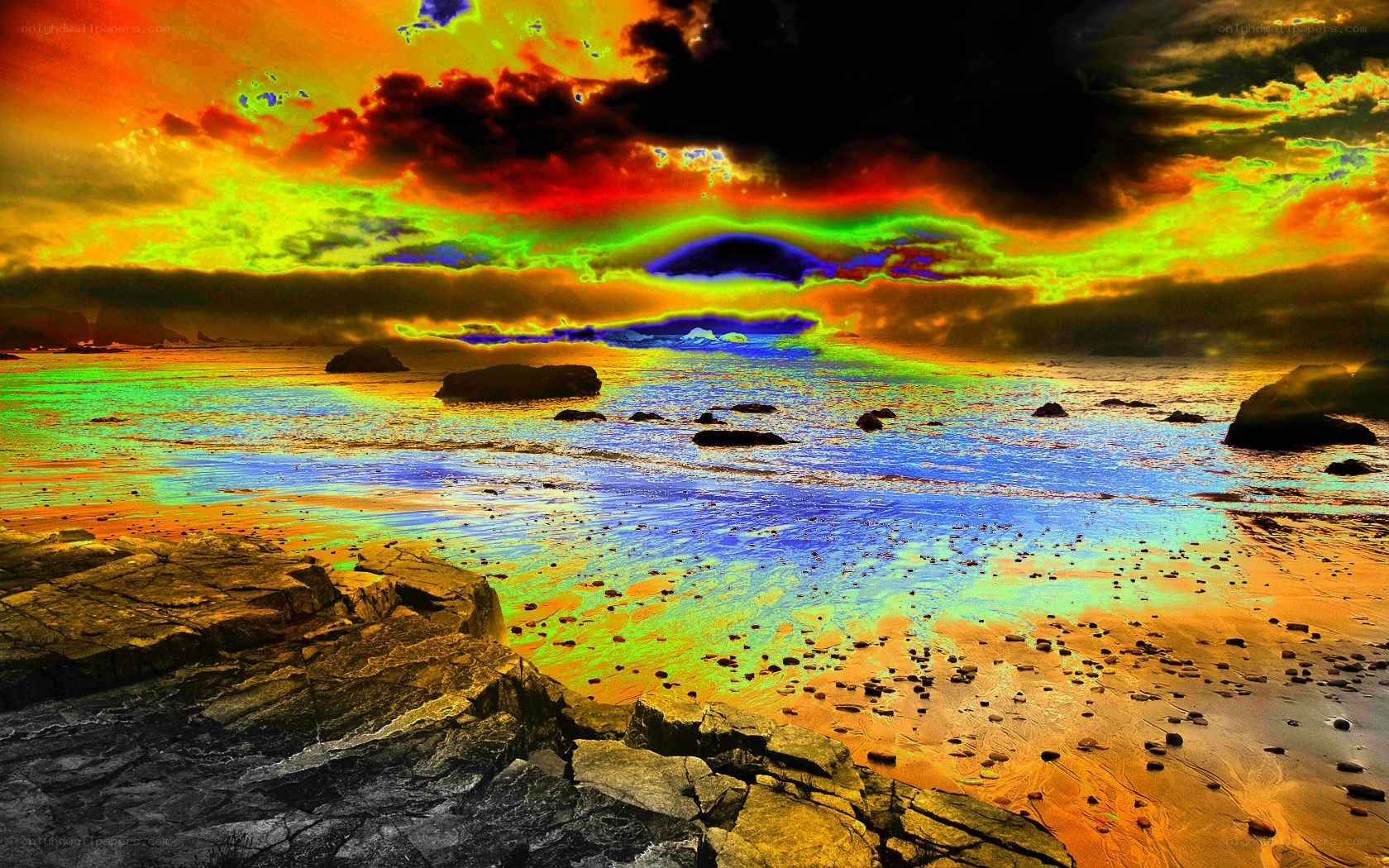 vibrant sunset over rocky beach