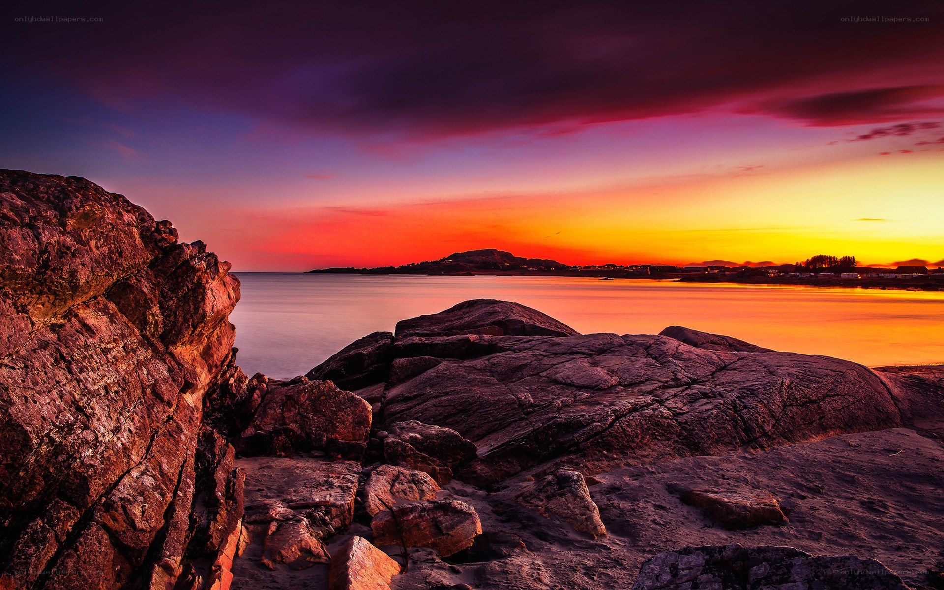 Vibrant sunset over rocky coast