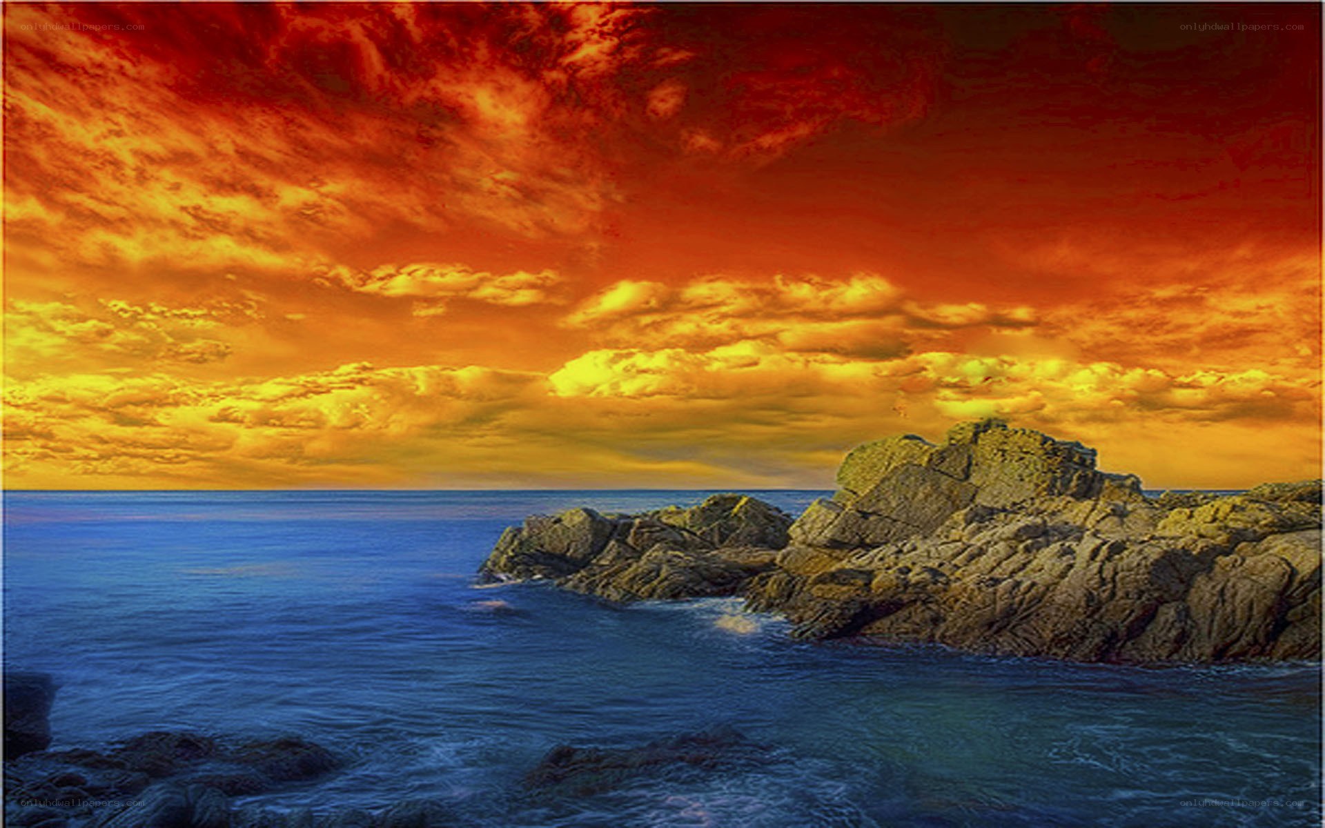 Vibrant sunset over rocky coast