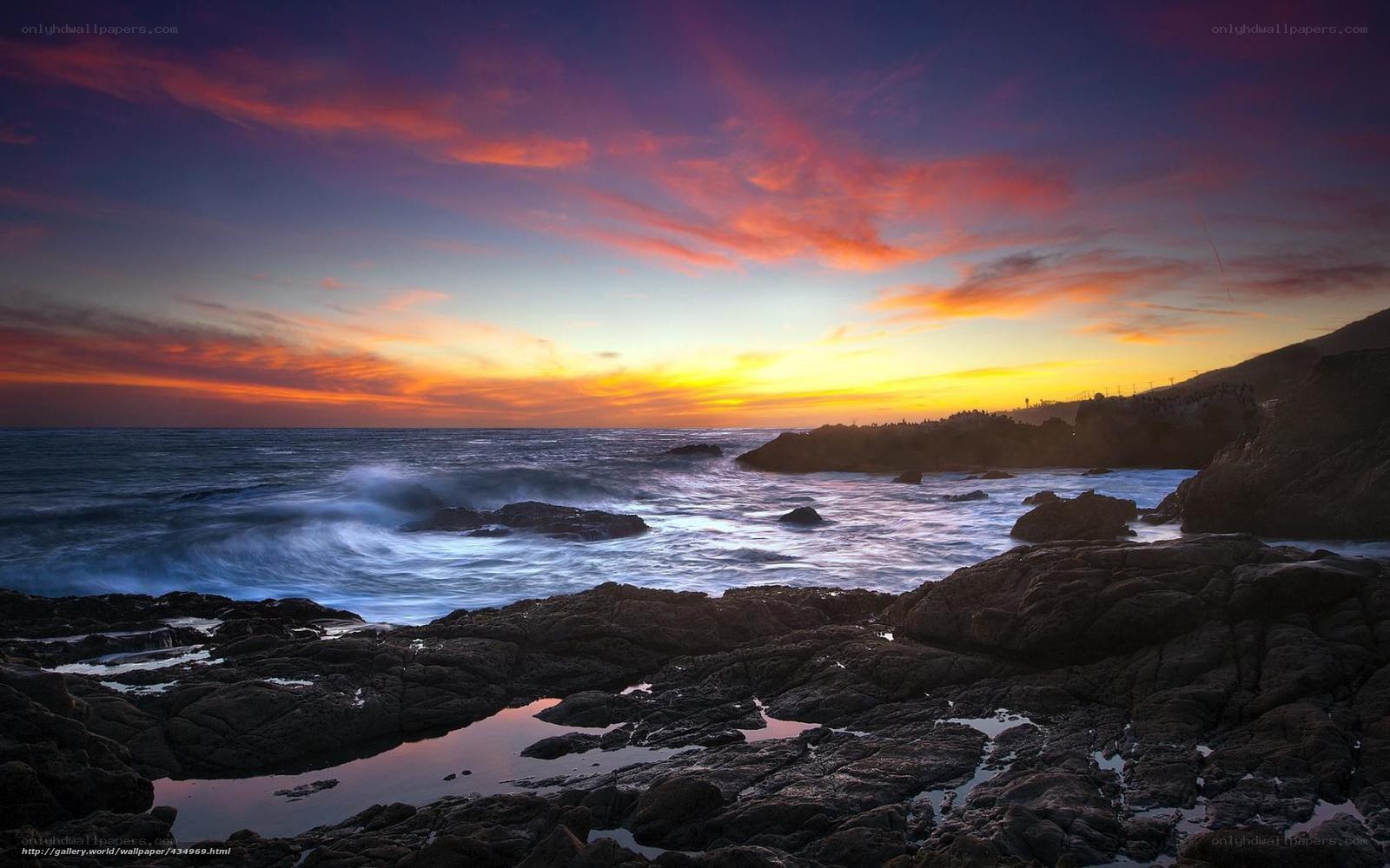 Vibrant sunset over rocky coast