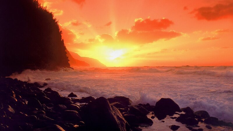 Vibrant sunset over rocky coast